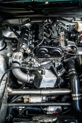 Fototapeta premium Car engine. Gasoline engine and car engine structure during technical inspection