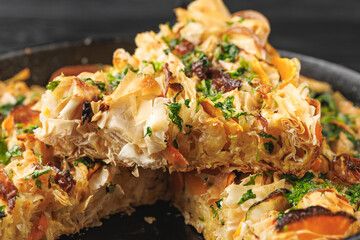 Filo pastry Veggie crinkle cake served with garlic and parsley butter on top