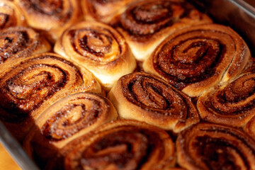 Cinnamon bun roll in plate. Homemade Oven bakery desert for breakfast
