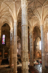 Obraz premium Mosteiro dos Jerónimos de Santa Maria de Belém, It is a former monastery of the Order of Saint Jerome and is located in the Belén neighborhood, and Igreja de Santa Maria de Belém in Lisbon, Portugal.