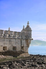 Fototapeta premium The Belém Tower is an old military construction, located at the mouth of the Tagus River, in the Santa Maria de Belém neighborhood, together with the Jerónimos Monastery in Lisbon, Portugal.