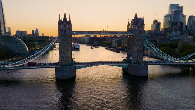 Flyover London River Thames Tower Bridge and famous city skyline in summer.