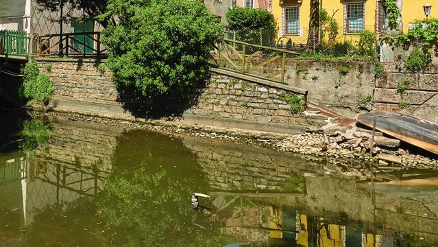 Seriola canal and bridge in park. Valmarana Salvi gardens are public garden located in historic center of Vicenza, Italy, adjacent to walls of Piazza Castello, in Piazzale De Gasperi.