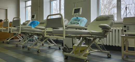 blood donation and transfusion room with empty beds