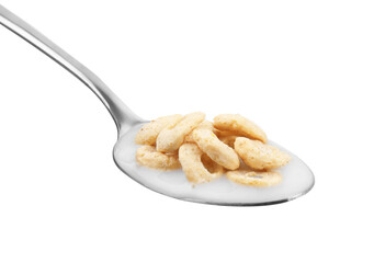 Cereal rings and milk in spoon isolated on white