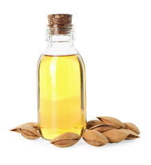 Bottle of almond oil and fresh nuts isolated on white