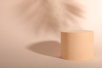 Presentation of product. Podium and shadows on pink background. Space for text