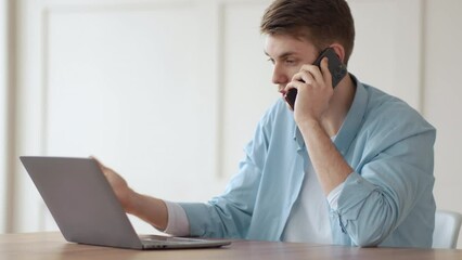 Dissatisfied client explaining computer problem to customer support by phone, complaining about bad service
