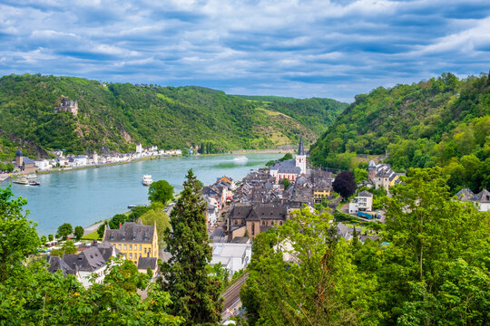 View over towns Sankt Goar and Sankt Goarshausen on bank of Rhine River in Rhineland-Palatinate, Germany. Rhine valley is famous tourist destination for romantic river cruise and short vacation