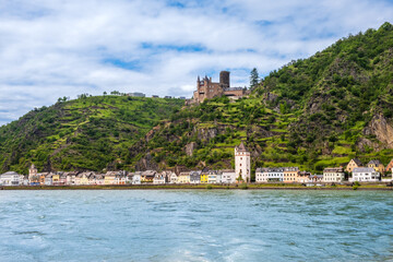 View of Sankt Goarshausen town and Katz castle on bank of Rhine River in Rhineland-Palatinate,...