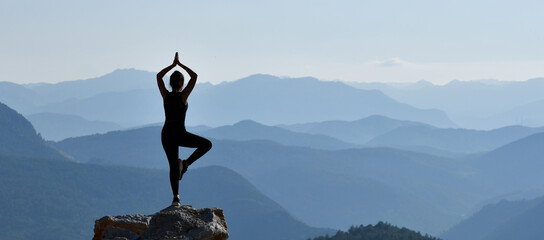 Teenager Practicing Yoga in a Beautiful Landscape