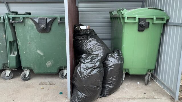 Green garbage can is used for waste containment and garbage collection located in special place for food waste