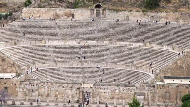 Roman Theater, Roman ruins, people walk through the amphitheater
