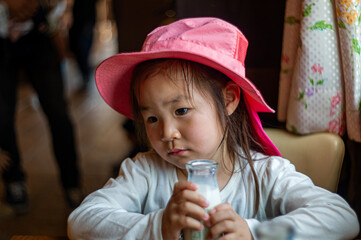 little child drinking milk