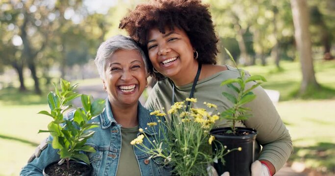 Women, volunteer and hug with plants in park for earth day, community service and sustainable ngo project. People, portrait and happy in nature for gardening, charity teamwork and eco friendly hobby