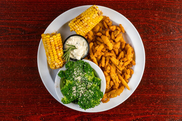 Fried clam strips with vegetables