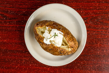 Baked potato with sour cream