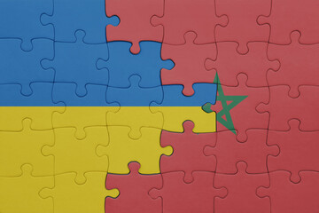 Fototapeta premium puzzle with the colourful national flag of morocco and flag of ukraine.
