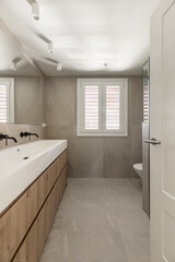 The design of a bathroom has to consider the use of both hot and cold water in significant and moderate quantities to wash the human body