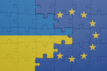 puzzle with the colourful national flag of european union and flag of ukraine.