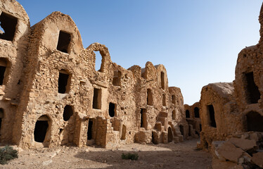 Uninhabited dwellings in village of Berbers. Gsar of Mgabla, Berber, Tatahouine. Uncomplicated and...