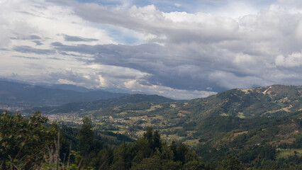 mountainous landscape with town in the background