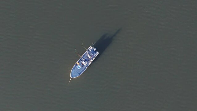 Aerial Panning Of Fishermen Fishing From Small Boat. Dique la Angostura In Taf&iacute; del Valle, Tucum&aacute;n, Argentina