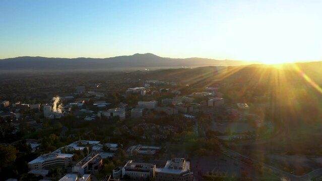 Sun rising over university in the morning