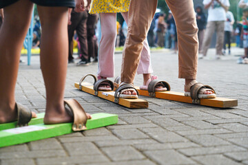 Bakiak is a traditional game played in groups using sandals or long wooden trumpets in a row. Clogs...