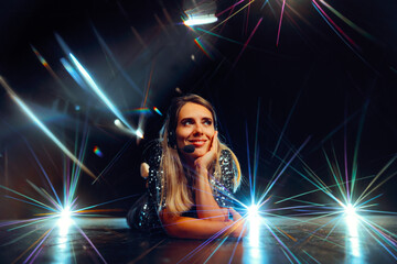 Pop star Sitting on a Stage Rehearsing for her Musical Performance. Portrait of a celebrity...