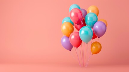 A cluster of colorful balloons floating in front of a soft pastel pink background, arranged in a cheerful composition