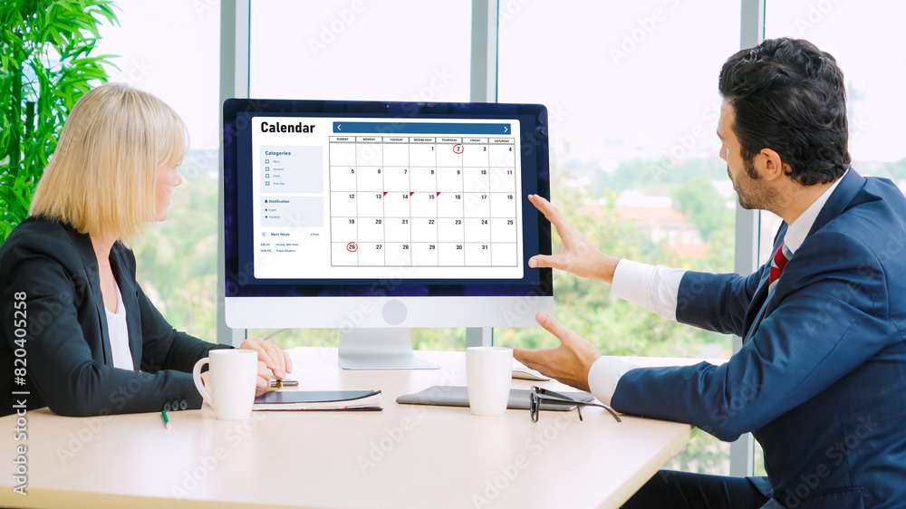 Poster calendar on computer software application for modish schedule planning for personal organizer and on