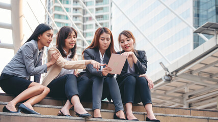 Businesswomen Partner use digital tablet online meeting team Partnership businesswoman talking...