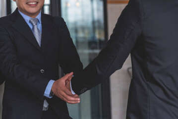 Businessman handshake manager recruitment team business. Partners shaking hands together greeting...