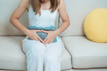 Menstruation period cycle of monthly and Stomachache concepts. woman having abdomen pain and...