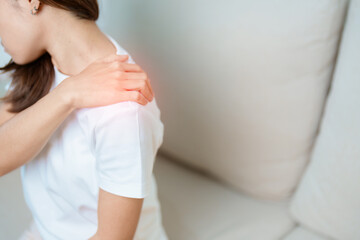 Woman having Shoulder and Neck pain at home. Muscle painful due to Myofascial pain syndrome and...