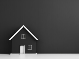 Black and white photo of a small house.