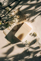 Modern organic soap bar mockup on marble background with white flowers in sunlight, Generative AI