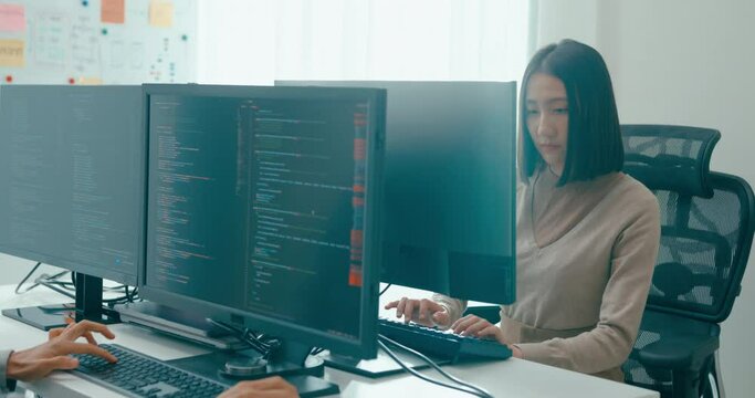 Group Adult Asia male, female freelance typing write prompt AI bot IT app smart program nomad, video game, terminal with coding language, user interface, designer, big data center on desktop computer.