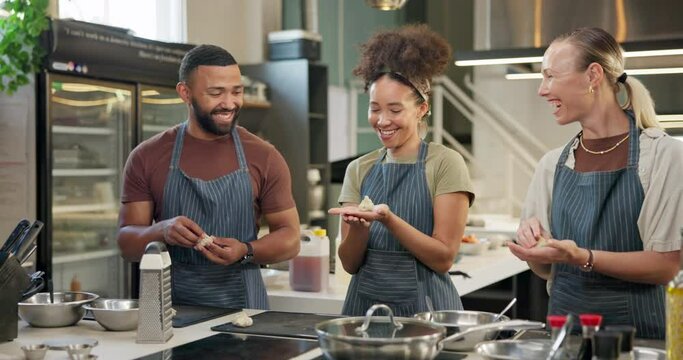 Kitchen, chef and high five for cooking in restaurant with food, teamwork or support in baking class. Cooks, collaboration and success in catering, business or pride for fine dining achievement