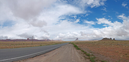 Driving to Monument valley by Arizona lonely desert road