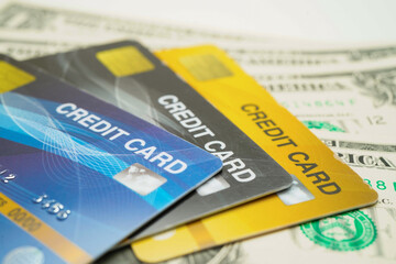 Credit card model on US America banknotes, finance and business.