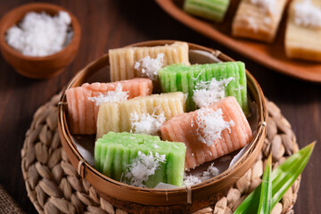 Getuk Lindri is a traditional Indonesian dessert made from mashed cassava, and topped with grated...