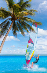 Windsurfer Surfing The Wind On Waves In Cancun bay - Cancun, Mexico