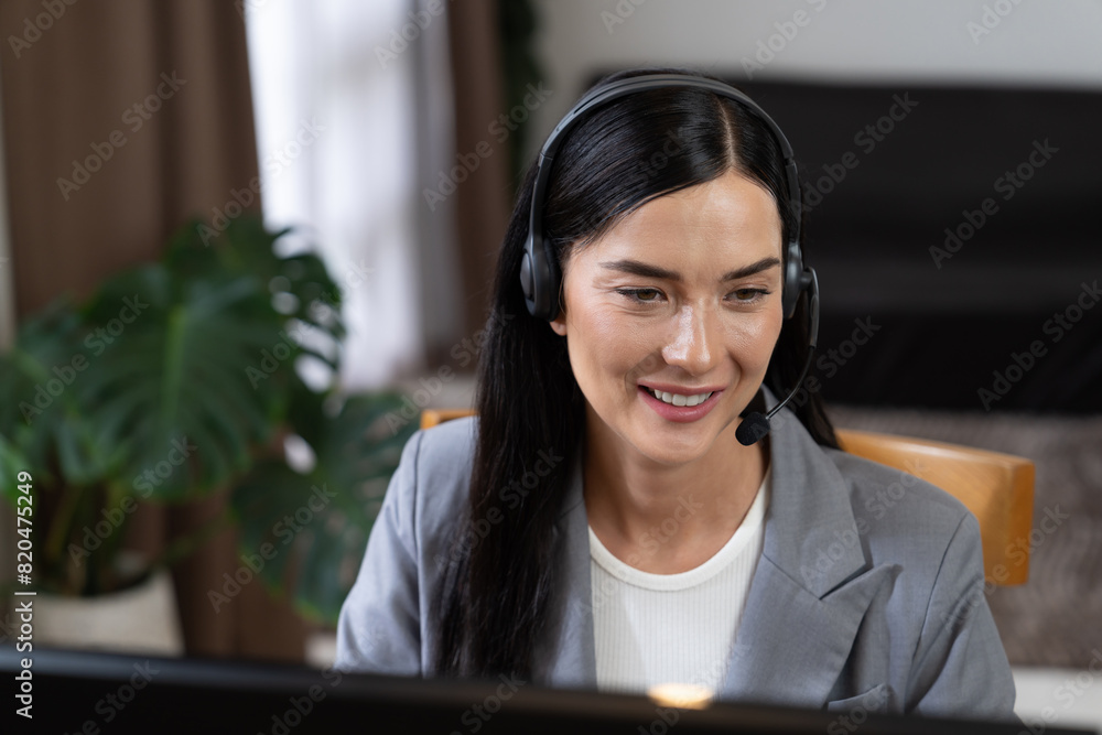 Aufkleber female call center operator or customer service helpdesk staff working on workspace while talking on