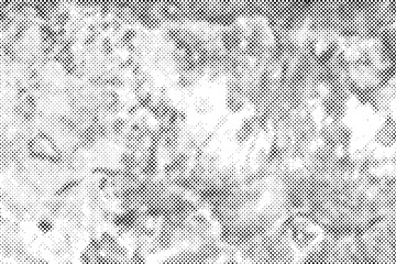 Vector black dots grunge halftone effect on white background.
