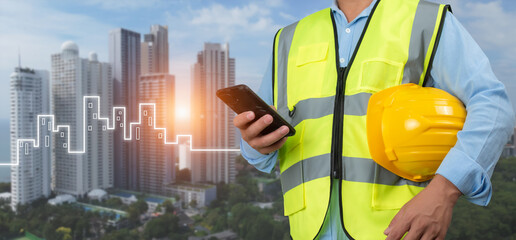 Civil engineer architect Using a smartphone to communicate and give orders to the construction team, Engineer building concept, Background for construction, Technology to construction.
