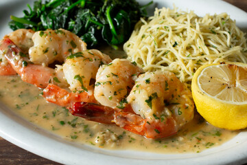A closeup view of a plate of shrimp scampi.