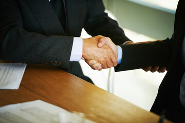 Business people, handshake and collaboration in office together for meeting, discussion or deal...