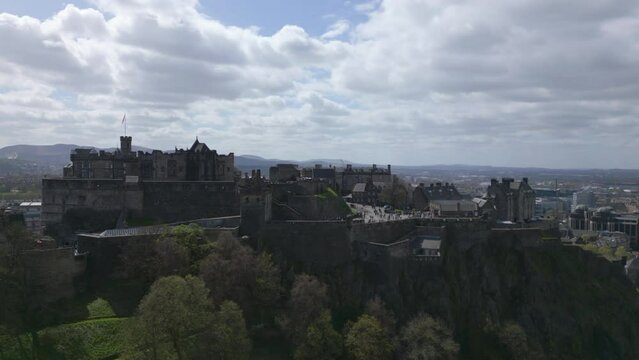 Drone low angle view of the Edinburgh Castle on the castlehill in Scotland.
